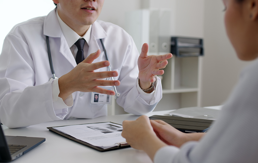 Patient discussing femoral hernia with a urologist