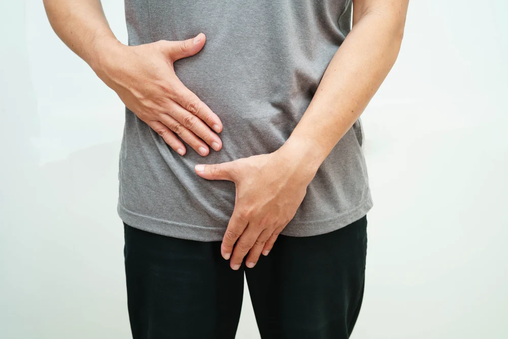 Male patient experiencing discomfort due to a kidney condition or prostate disease, considering visiting a urology clinic